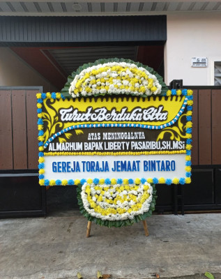 Papan Bunga Duka di Uluan