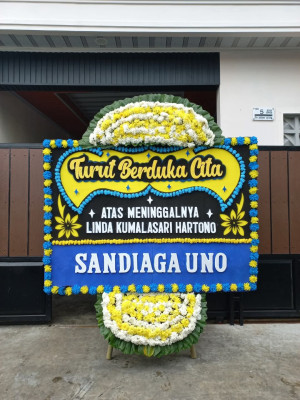 Papan Bunga Duka di Uluan